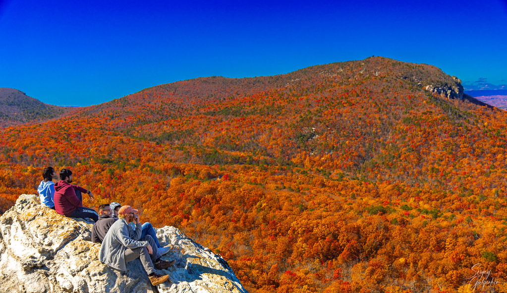Best Hiking In The Greensboro and Winston-Salem Area - Hikers hanging out in Hanging Rock State Park